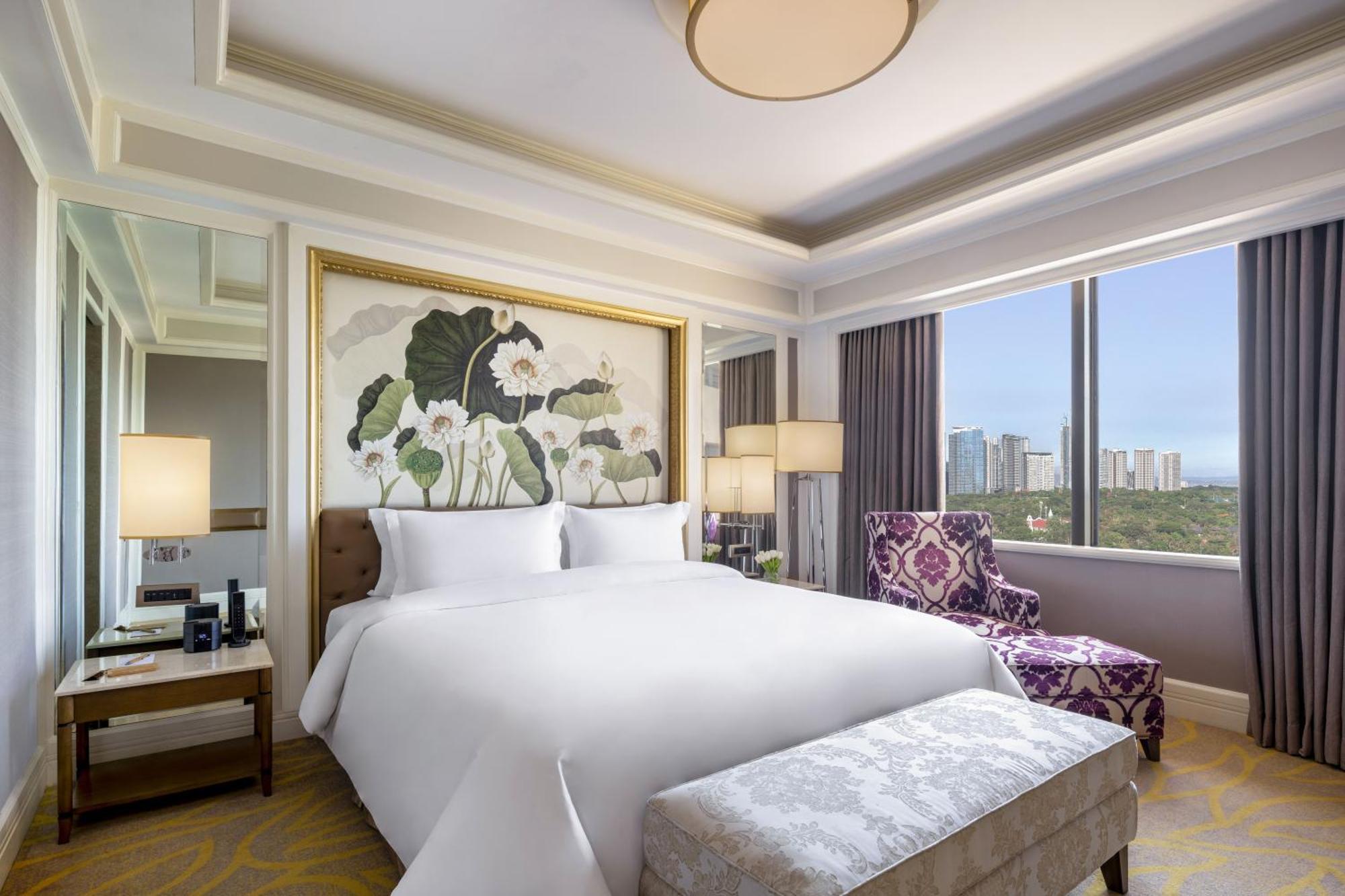 Dusit Thani Manila Makati City Phòng bức ảnh A bedroom at the hotel